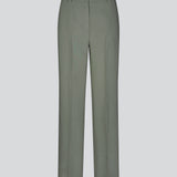 Gale pants in soft green has a classic design. The pants has straight, wide legs with pressfolds, which creates an elegant look. The model is 175 cm and wears a size S/36.<br>
