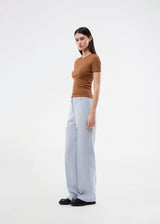 Gale pants has a classic design. The pants has straight, wide legs with pressfolds, which creates an elegant look.
