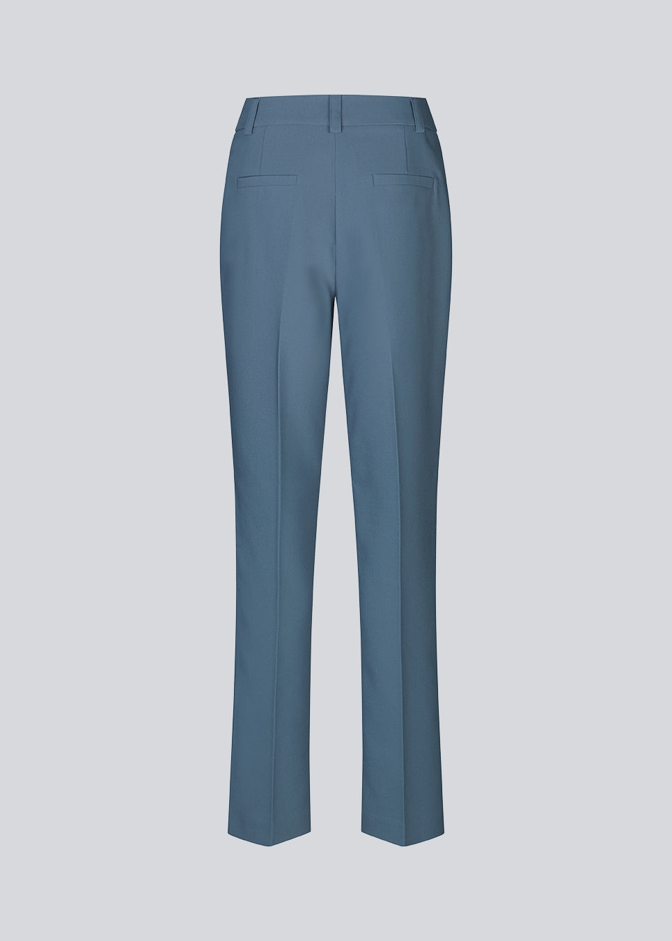 Gale straight pants in dark blue is a menswear-inspired style with straight, slim legs. The design of the pants is kept classic with press folds and a high waist. 