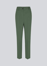 Gale straight pants in sea green is a menswear inspired style with straight, slim legs. The design of the pants is kept classic with pressfolds and a high waist. The model is 173 cm and wears a size S/36. 