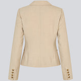GaleMD 2 short blazer features the classic Gale design but in a lighter quality. The blazer is fitted, slightly cropped, and has a button closure and two pockets in front. The blazer is light cream.
