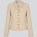 GaleMD 2 short blazer features the classic Gale design but in a lighter quality. The blazer is fitted, slightly cropped, and has a button closure and two pockets in front. The blazer is light cream.