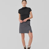 Classic A-line skirt in grey with a short length. GaleMD 2 skirt has a simple design with a hidden zipper at the side seam and a slit in front. The model is 175 cm and wears a size S/36.