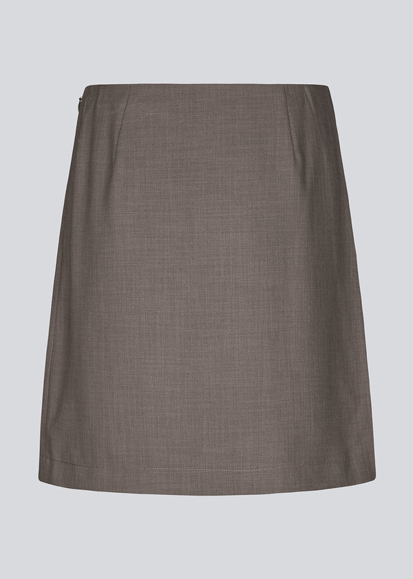 Classic brown A-line skirt with a short length. GaleMD 2 skirt has a simple design with a hidden zipper at the side seam and a slit in front.  The skirt is bigger than our regular GaleMD skirt.&nbsp