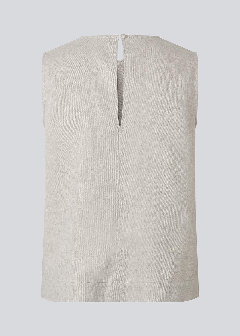 Sleeveless linen top. The GaleMD Linen Top features a round neckline and a hook closure at the back. A light and elegant top, perfect for both relaxed and stylish summer looks.