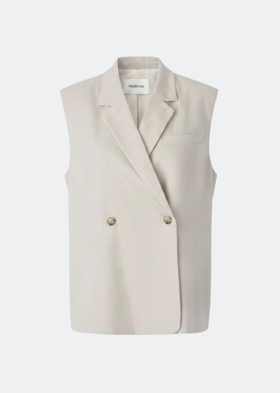 Our classic Gale Vest in linen quality. The GaleMD linen vest has a relaxed fit, is sleeveless, and features a front button closure. A timeless and elegant choice that combines lightness with a modern, relaxed silhouette. Galemd vest is sleeveless and has a front button closure.