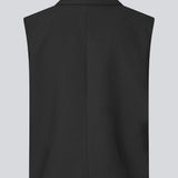 Loose vest with a collar in our classic gale material. Galemd vest is sleeveless and has a front button closure. The model is 175 cm and wears a size S/36.