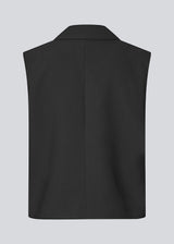 Loose vest with a collar in our classic gale material. Galemd vest is sleeveless and has a front button closure. The model is 175 cm and wears a size S/36.