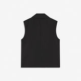 Straight-cut black sleeveless vest. It has a defined lapel collar and double-breasted button closure. Wear it with the matching Gale pants for a structured set. The model is 175 cm and wears a size S/36.