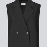 Loose vest with a collar in our classic gale material. Galemd vest is sleeveless and has a front button closure. The model is 175 cm and wears a size S/36.