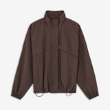 GannonMD Jacket is a short jacket with a relaxed fit and high collar. The design features a concealed front fastening, large front pockets, elasticated cuffs and an adjustable drawstring hem. The gathered detail at the back adds extra volume to the silhouette. Style it over a T-shirt or knitwear for a relaxed everyday look.
