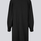 Black dress with a loose silhouette in a structured material. GemmiMD dress has long, voluminous balloon sleeves with cuff and a v-neckline. The model is 175 cm and wears a size S/36.