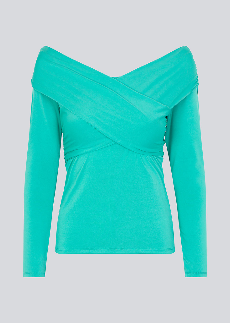 Long-sleeved top in turquoise in a soft quality. GeorgiaMD wrap top has a slim silhouette and a slight off-shoulder-effect with a draped wrap look at the top. The model is 175 cm and wears a size S/36.