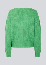 Soft, short cardigan in wool mix in green. Goldie cardigan has structure and button closure.