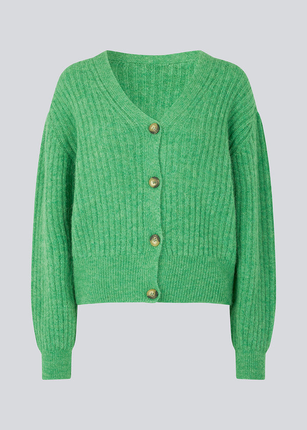 Soft, short cardigan in wool mix in green. Goldie cardigan has structure and button closure.