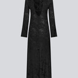 Long sleeved dress in jacquard satin. GraceyMD dress is designed with a relaxed fit and a deep opening in the back with lacing and narrow ties. Slit at center back. The model is 175 cm and wears a size S/36.