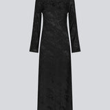 Long sleeved dress in jacquard satin. GraceyMD dress is designed with a relaxed fit and a deep opening in the back with lacing and narrow ties. Slit at center back. The model is 175 cm and wears a size S/36.