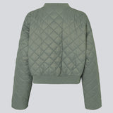 Lightly padded jacket in a quilted material with a short, ribbed collar, and zipper in front. HankMD jacket has a short and loose fit. Made from recycled nylon. The model is 175 cm and wears a size S/36.