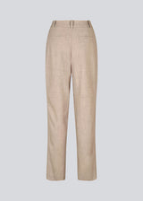 High-waisted beige pants in a woven quality with zip fly with hidden hook and bar closure. HeartMD pants has slanted side pockets and faux welt pockets in the back. Straight legs. The model is 175 cm and wears a size S/36.

Material:
4% Elastane
68% Polyester
28% Rayon