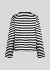 Longsleeved t-shirt in white made from cotton jersey with black stripes. HellenMD LS stripe t-shirt has a relaxed silhouette with wide sleeves and a round neck. The model is 175 cm and wears a size S/36.