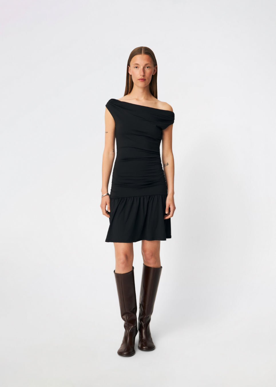Off-the-shoulder dress crafted from a soft and stretchy fabric. HimaMD Flare Dress features a fitted silhouette with a wide folded neckline that can be worn off the shoulders, gathered detailing at the waist, and a feminine flared hem. The body-hugging fit enhances the silhouette, while the soft stretch fabric ensures all-day comfort.