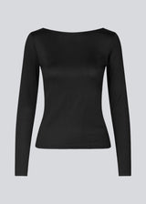 Black top with long sleeves made of elastic material. HimaMD LS top is fitted and has a deep back neckline.