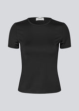 Fitted black T-shirt in 95% recycled polyester. The Himamd O-Neck T-Shirt features a flattering cut and is an everyday favorite that can be easily styled with anything.

Material:
5% Elastane
95% Recycled Polyester