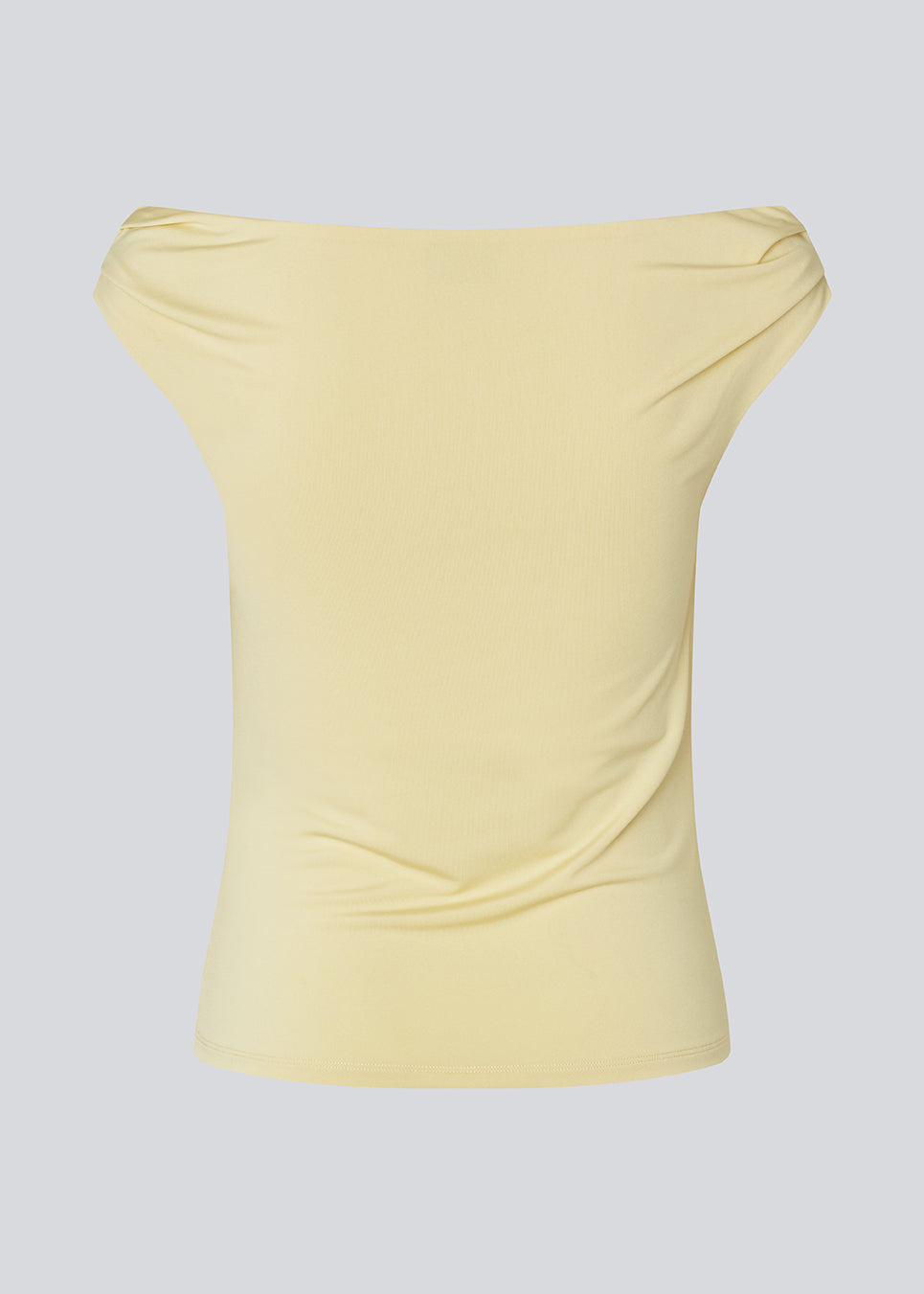 Off-shoulder top in a stretchy material. HimaMD off-shoulder top is fitted and slightly cropped. 