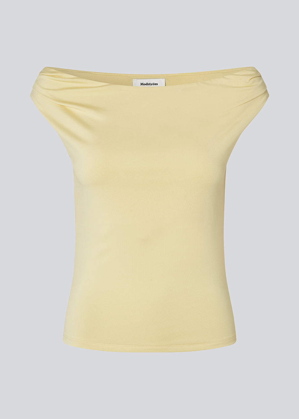 Off-shoulder top in a stretchy material. HimaMD off-shoulder top is fitted and slightly cropped. 