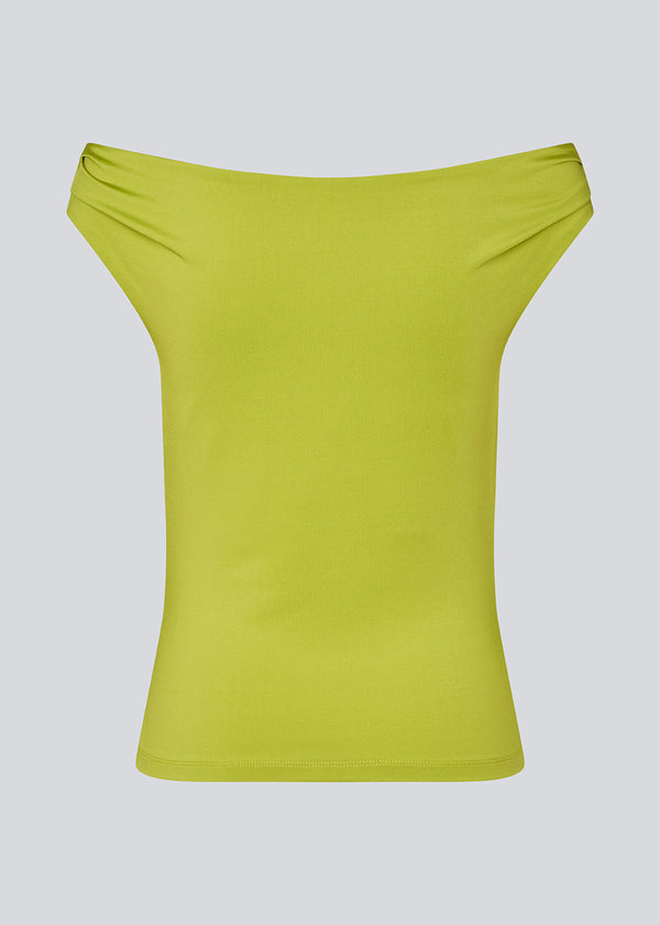 Off-shoulder top in lime green in a stretchy material. HimaMD off-shoulder top is fitted and slightly cropped.