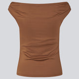 Off-shoulder top in a stretchy material. HimaMD off-shoulder top is fitted and slightly cropped.
