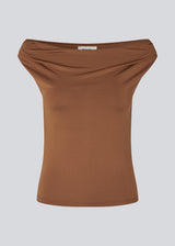 Off-shoulder top in a stretchy material. HimaMD off-shoulder top is fitted and slightly cropped.