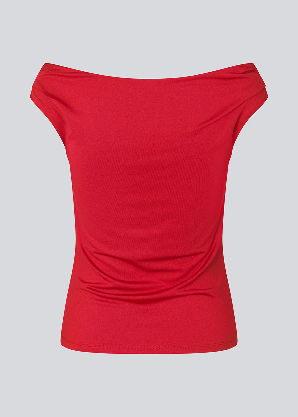 Red off-shoulder top in a stretchy material. HimaMD off-shoulder top is fitted and slightly cropped. The model is 175 cm and wears a size s/36.
