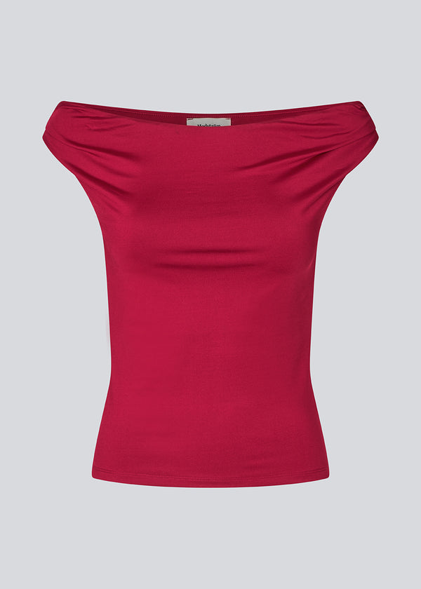 Off-shoulder top in a stretchy material. HimaMD off-shoulder top is fitted and slightly cropped.