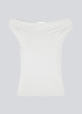 Off-shoulder top in white in a stretchy material. HimaMD off-shoulder top is fitted and slightly cropped.