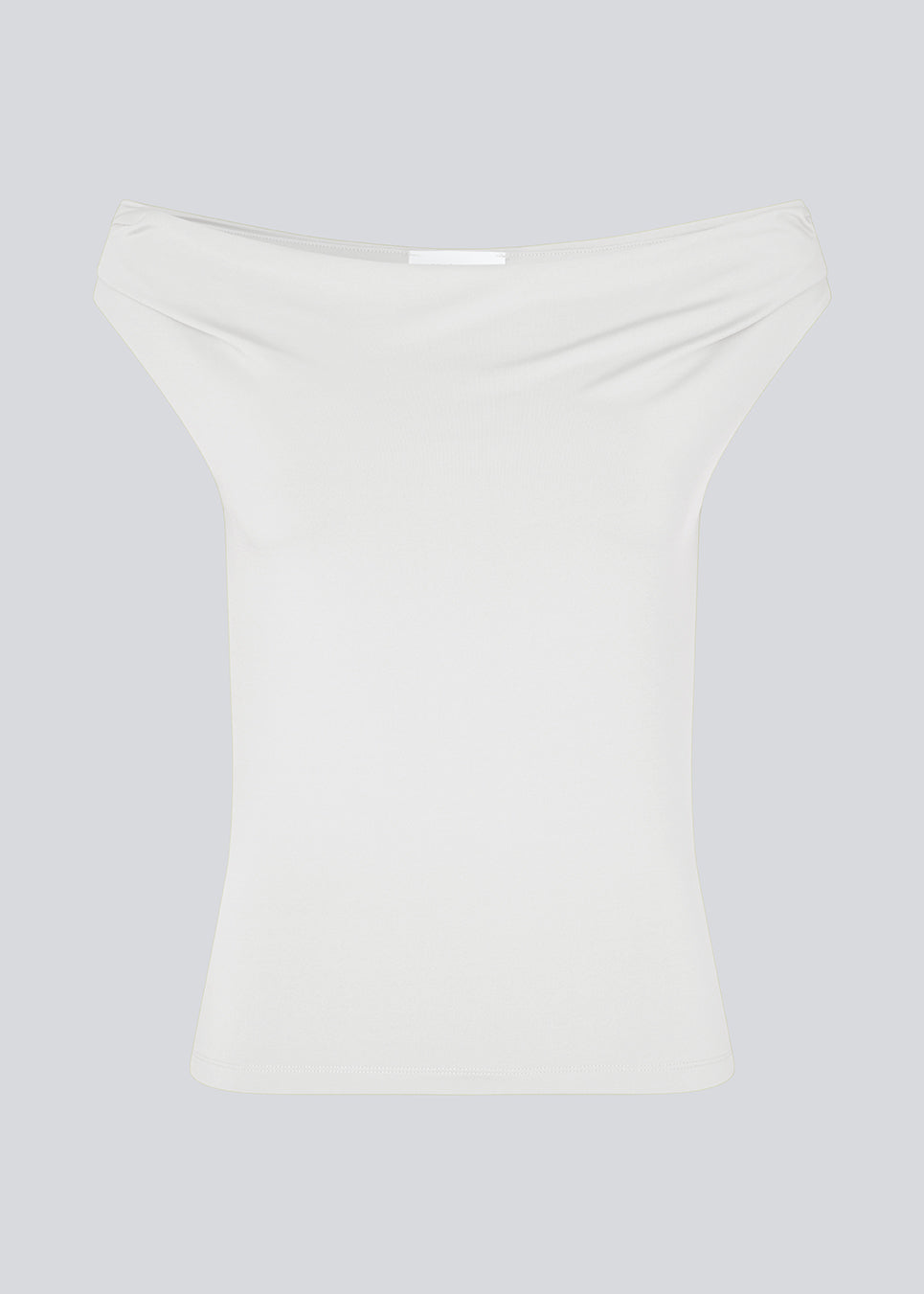 Off-shoulder top in white in a stretchy material. HimaMD off-shoulder top is fitted and slightly cropped.