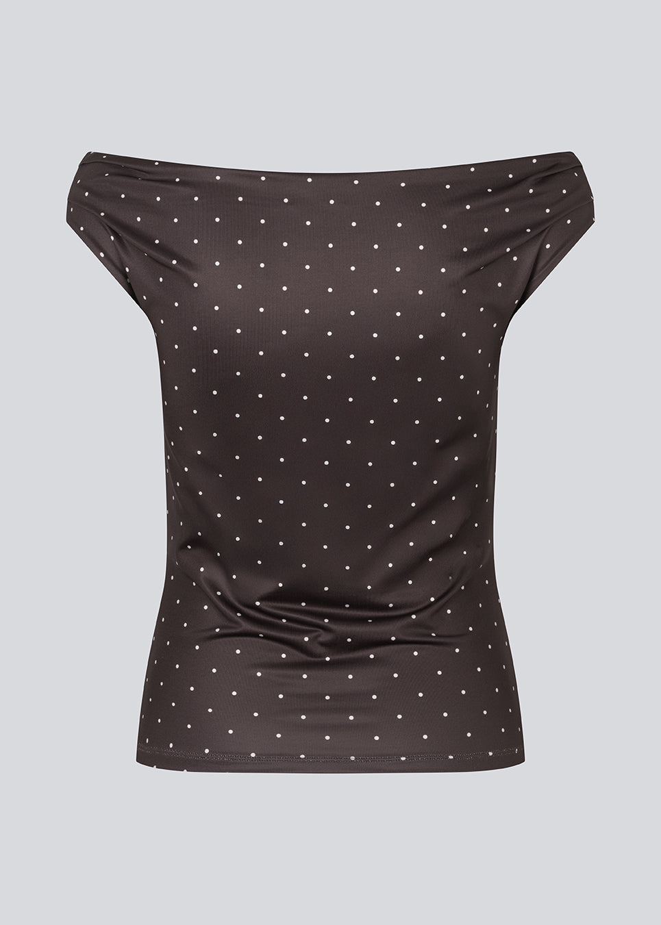 Off-shoulder top in dark brown with white small dots in a stretchy material. HimaMD off-shoulder top is fitted and slightly cropped.&nbsp;