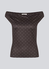 Off-shoulder top in dark brown with white small dots in a stretchy material. HimaMD off-shoulder top is fitted and slightly cropped.&nbsp;