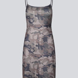 Modern printed strap dress. HimaMD print strap dress is a versatile design featuring a cool camouflage print, slim straps, and a clean, straight silhouette. It can be styled on its own or layered over trousers for a cool, fashion-forward look.