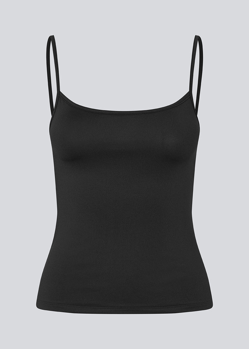 Fitted top in black in recycled polyester. Himamd strap top has a round neck and thin straps.