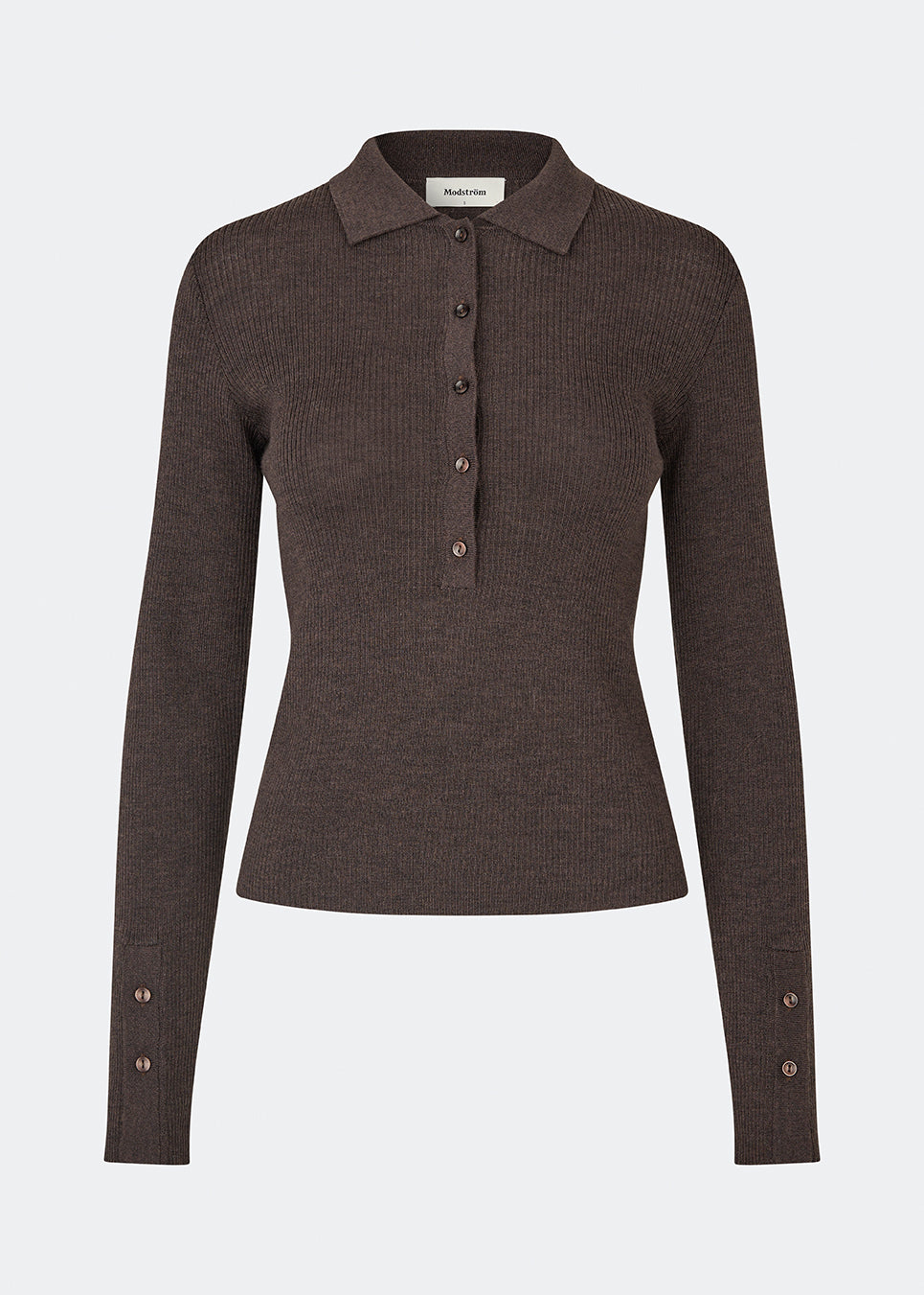 Fitted cardigan made from a soft, rib-knitted wool. HirokiMD cardigan has a collar, buttons in front, and long sleeves with slit and buttons. The model is 175 cm and wears a size S/36.