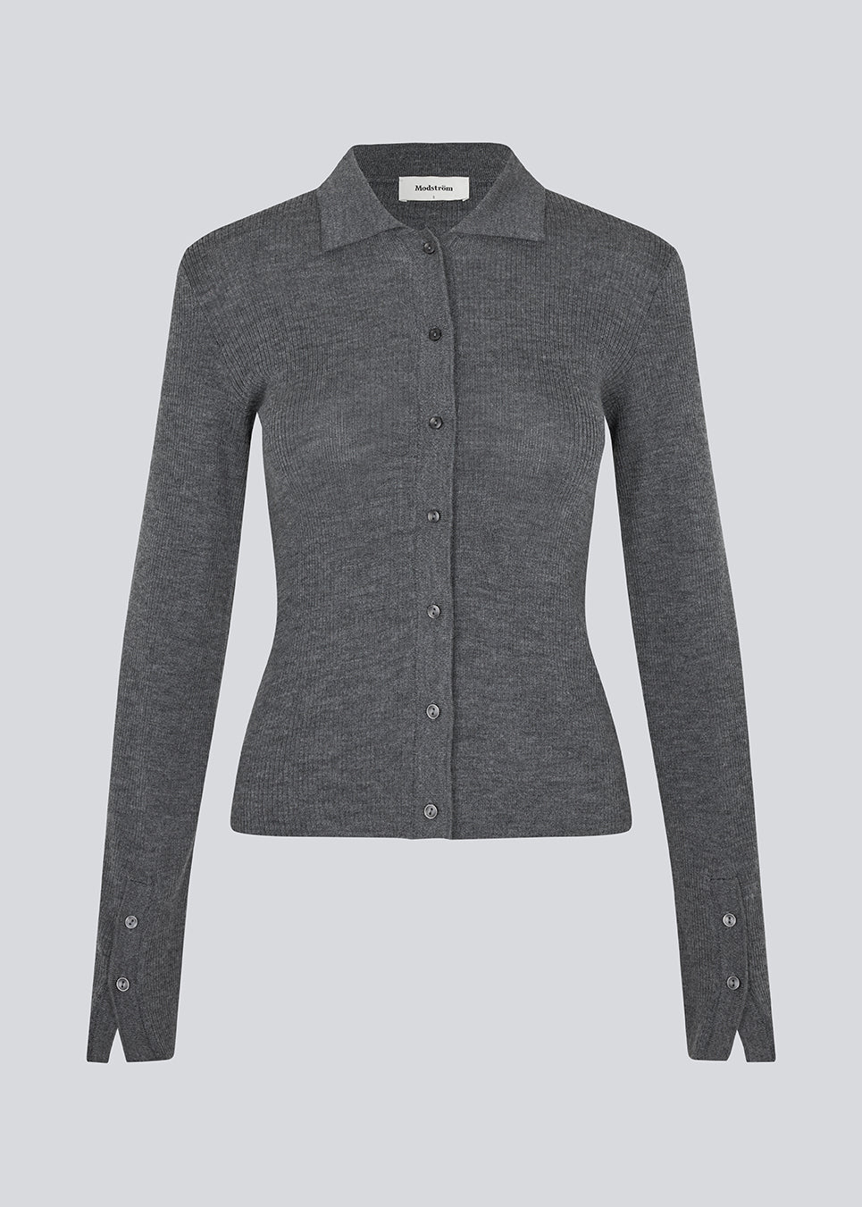 Dark grey fitted cardigan made from a soft, rib-knitted wool. HirokiMD cardigan has a collar, buttons in front, and long sleeves with slit and buttons. The model is 175 cm and wears a size S/36.