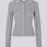 Fitted cardigan in grey melange made from a soft, rib-knitted wool. HirokiMD cardigan has a collar, buttons in front, and long sleeves with slit and buttons. The model is 175 cm and wears a size S/36.