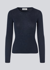 Fitted top made in a soft, rib-knitted wool. HirokiMD o-neck has long flared sleeves. 