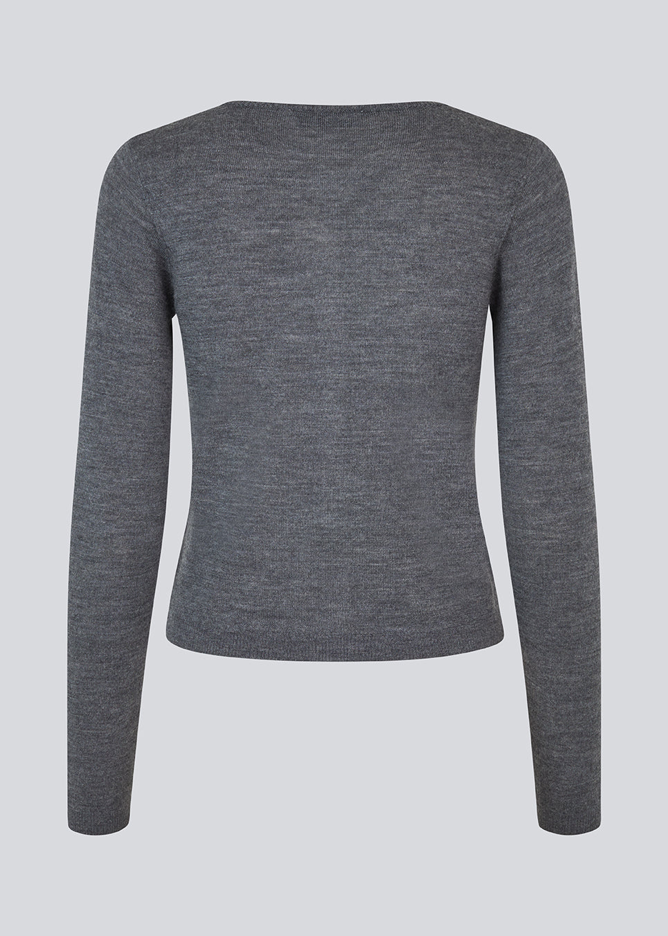 Fitted grey cardigan in soft knit. HirokiMD short cardigan has a round neck and a button closure in front. The model is 177 cm and wears a size S/36.