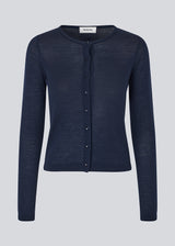 Fitted cardigan in soft knit. HirokiMD short cardigan has a round neck and a button closure in front. 