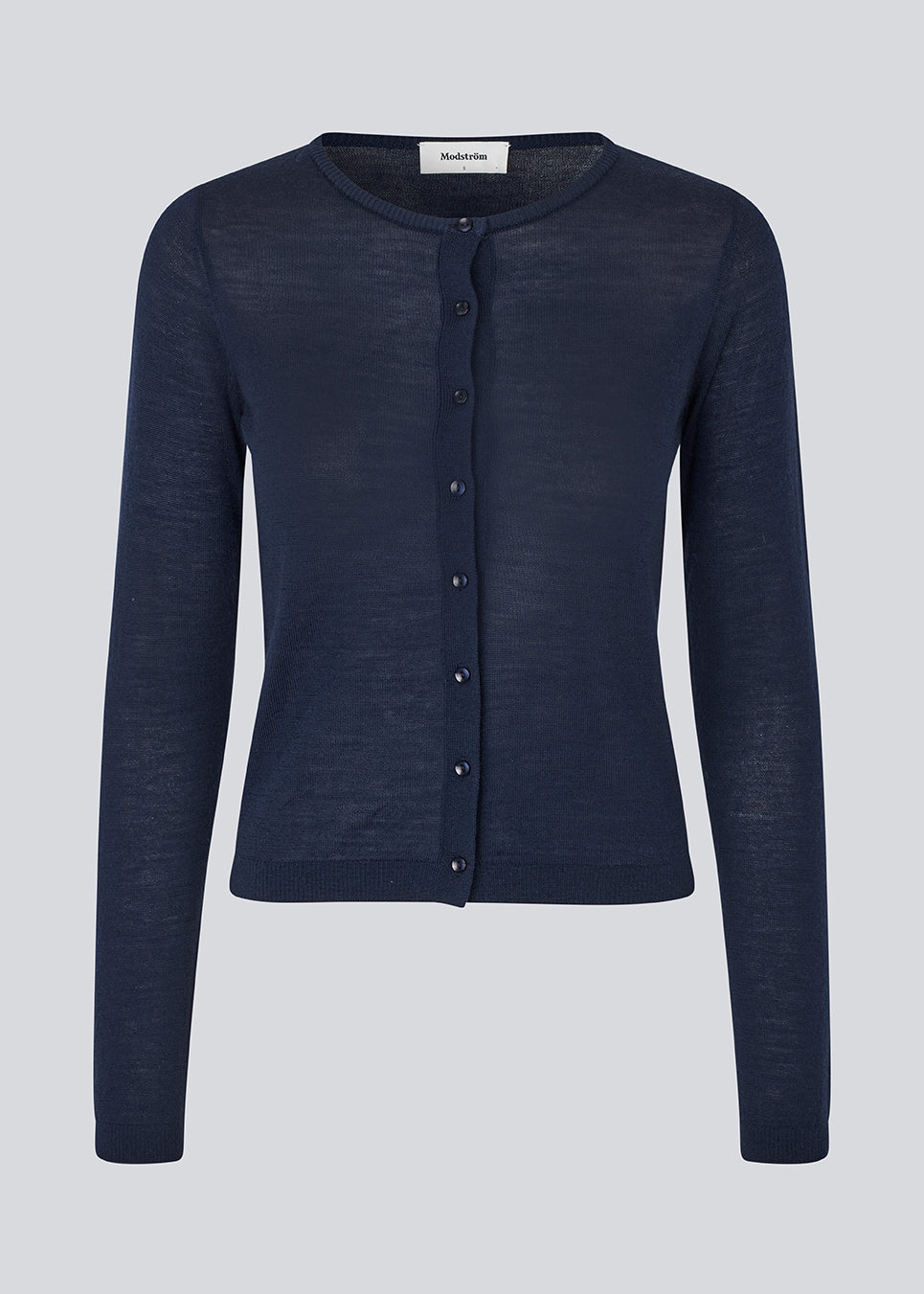 Fitted cardigan in soft knit. HirokiMD short cardigan has a round neck and a button closure in front. 