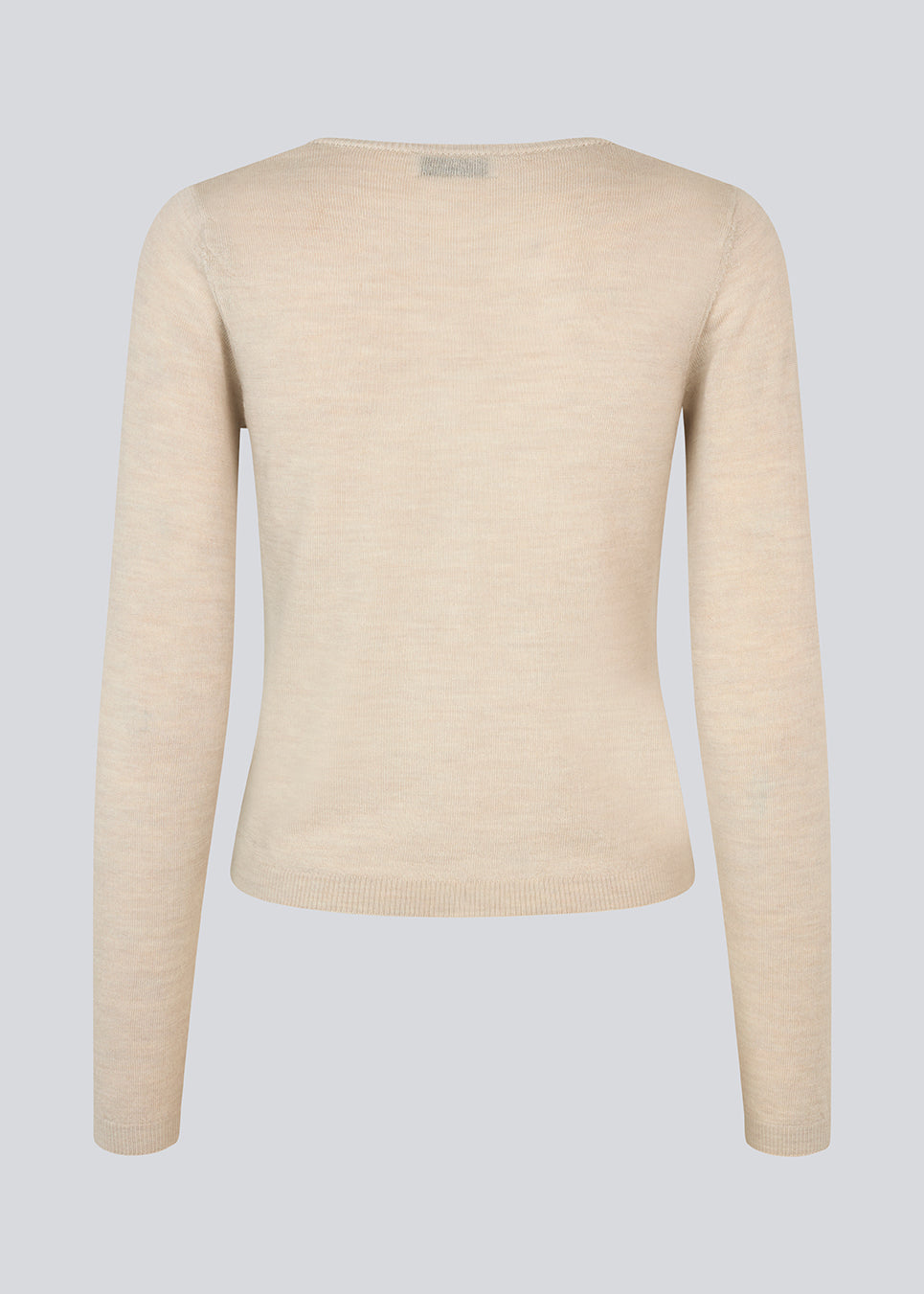Fitted beige cardigan in soft knit. HirokiMD short cardigan has a round neck and a button closure in front.
