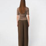 Fitted cardigan in soft knit. HirokiMD short cardigan has a round neck and a button closure in front. 