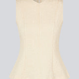 Tailored top in beige without sleeves made from a structured material. HollisMD top has a high v-shaped neckline with a hidden zipper at the neck. The model is 175 cm and wears a size S/36.